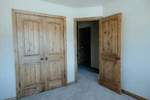 The wood doors and trim really add class to this space.  Every room boasts this beautiful knotty alder.