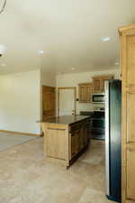 The sleek stainless steel appliances add class and sophistication to this kitchen.