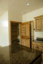 The large pantry really adds to the functionality of the this great working kitchen.