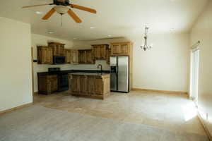 Whether you are enjoying breakfast in the dinning area, sitting at the bar with your morning OJ or watching a game with the family you will love this great room!