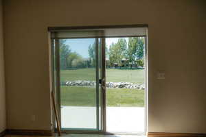 The sliding glass door lets in the light and opens you up to the beautiful surroundings.