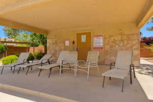 Covered Patio Seating & Outdoor Showers at Pool