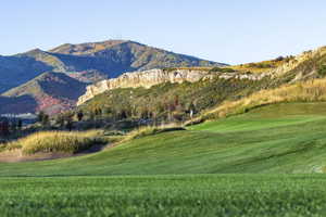 View of mountain backdrop featuring a local golf course