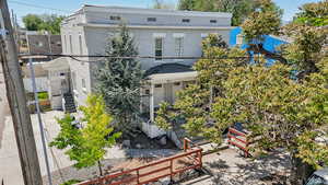View of front of house featuring fence