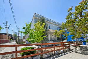 View of property's community featuring a fenced front yard