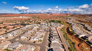 View of property location featuring nearby suburban area and mountains