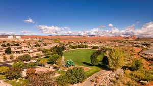 Aerial view of residential area featuring a mountain backdrop