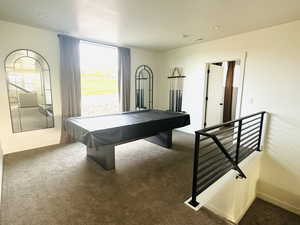 Recreation room featuring carpet flooring, pool table, and baseboards