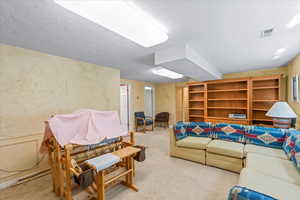 Living room with light colored carpet