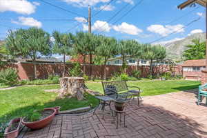 View of patio / terrace with a mountain view