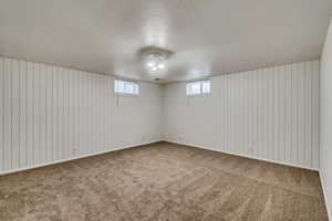 Bedroom area with carpet floors