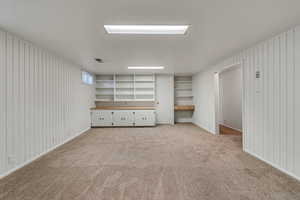View of carpeted Family Room with Built ins