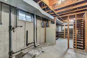 Basement Laundry/Storage area with built in shelves