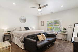Bedroom with dark carpet, recessed lighting, baseboards, and a ceiling fan