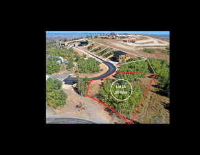 Aerial overview of property's location featuring property parcel outlined