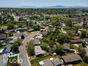 View of property location featuring nearby suburban area and a mountain backdrop