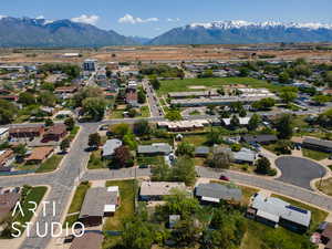 Aerial perspective of suburban area featuring mountains