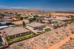Aerial view of residential area with a mountainous background