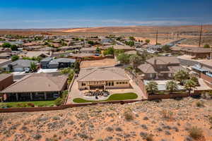 Aerial perspective of suburban area featuring a mountainous background