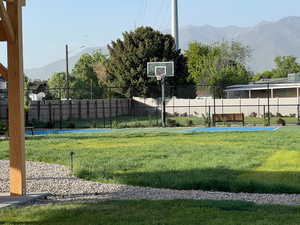 View of sport court featuring a mountain view and community basketball court