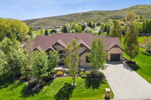 View from above of property featuring a mountainous background