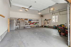Garage featuring a garage door opener