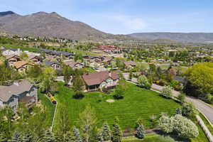 View of property location featuring a mountain backdrop and nearby suburban area