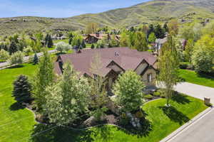 Aerial view of residential area with a mountainous background