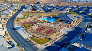 Aerial perspective of suburban area with a pool area