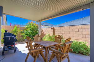 View of patio / terrace with outdoor dining space and a fenced backyard