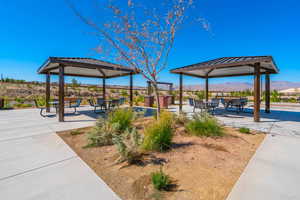 View of home's community with a gazebo and a mountain view