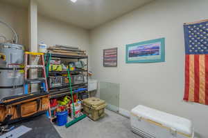 Storage area with electric water heater