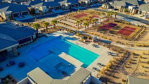 Aerial perspective of suburban area with a pool area