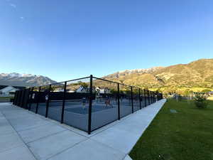 View of community featuring a pickle ball courts and a mountain view