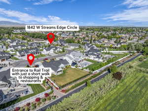 Aerial view of residential area with a mountainous background