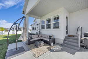 View of patio with an outdoor living space