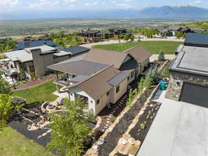 Aerial view of residential area featuring a mountain backdrop
