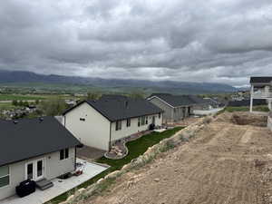 Aerial view of residential area with a mountain backdrop