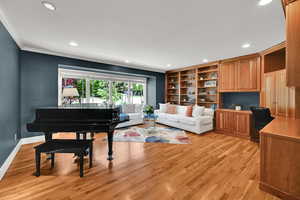 Private home office with custom cabinetry and new windows