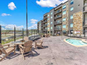 View of pool with fence