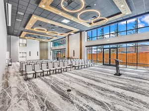 Lobby featuring a high ceiling and recessed lighting