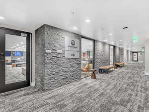 Community lobby featuring recessed lighting