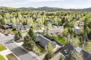 Aerial view of residential area with a mountainous background