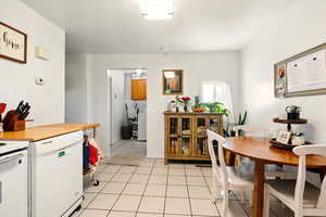 Back Unit's Dining space with washer / clothes dryer