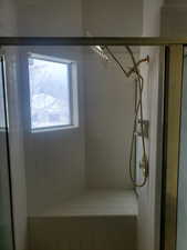 Bathroom with a tile shower