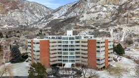 View of building exterior featuring a mountain view