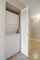 Laundry room with estacked washer and dryer