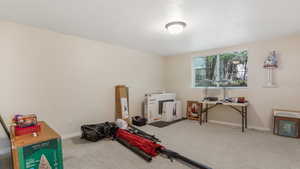 Playroom with carpet flooring and baseboards