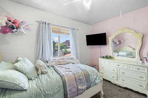 Bedroom with carpet floors and ceiling fan