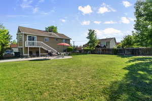 View of yard with a patio and cooling unit